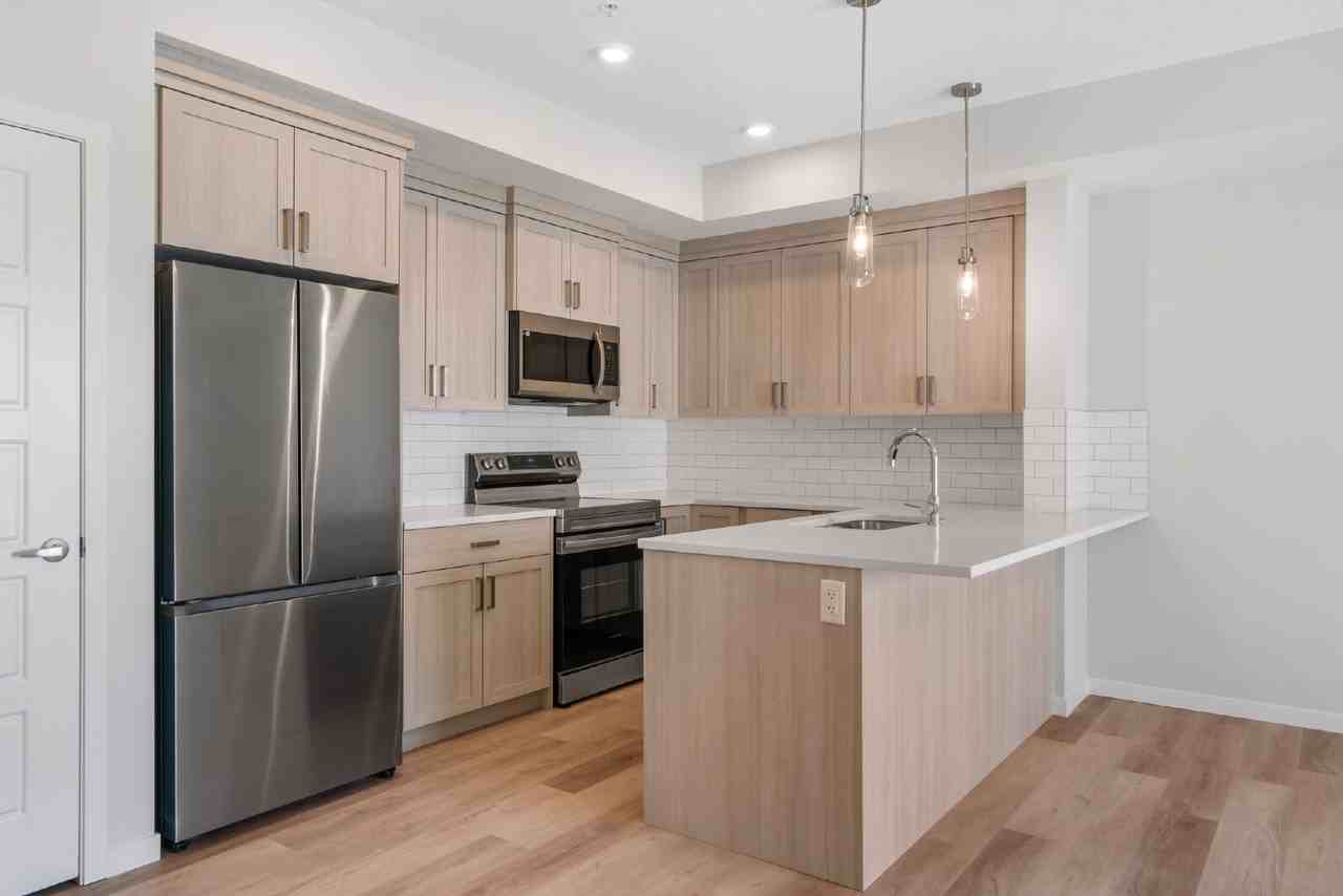 415, 360 Harvest Hills Way NE - Photo 3 of 29
