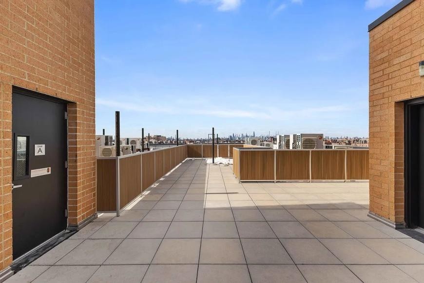9109 Roosevelt Ave - Photo 6 of 10