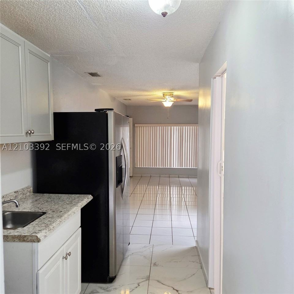 5871 Nw 199th St #5871L - Photo 4 of 13