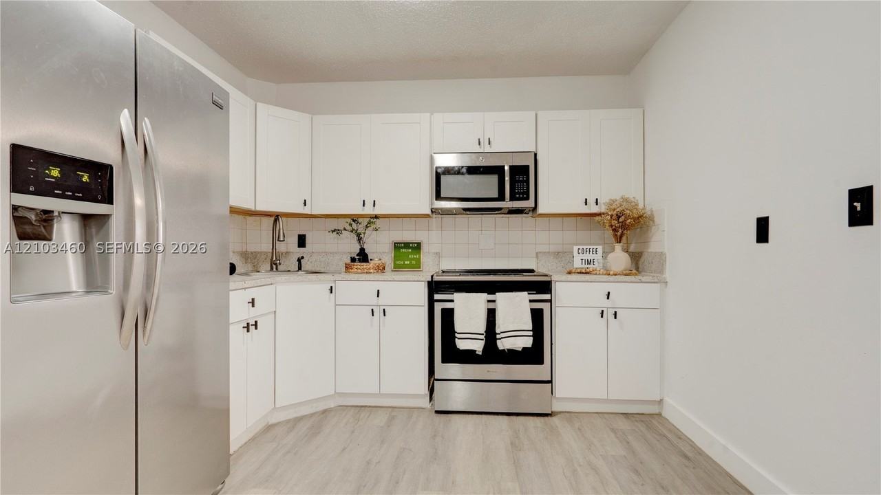 1036 Nw 75th St #MAIN - Photo 4 of 12