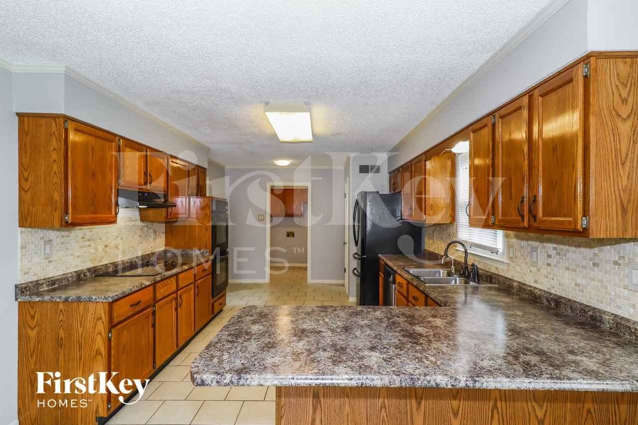 8508 Chimneyrock Blvd - Photo 7 of 15