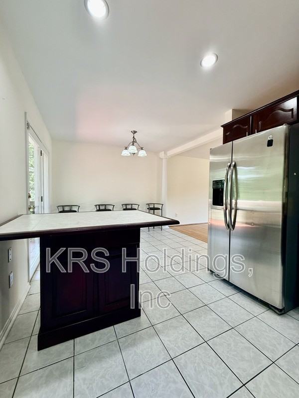7700 Newington Forest Ave - Photo 6 of 20