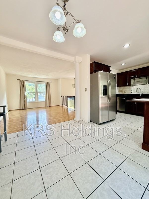 7700 Newington Forest Ave - Photo 7 of 20