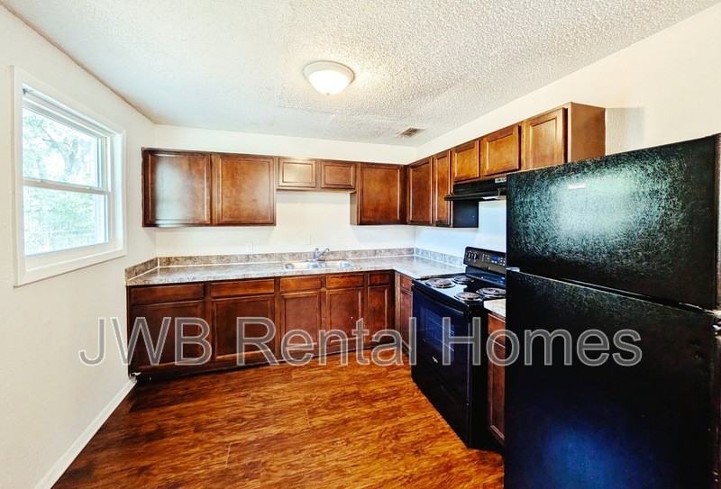 6735 Miss Muffet Ln N - Photo 2 of 14