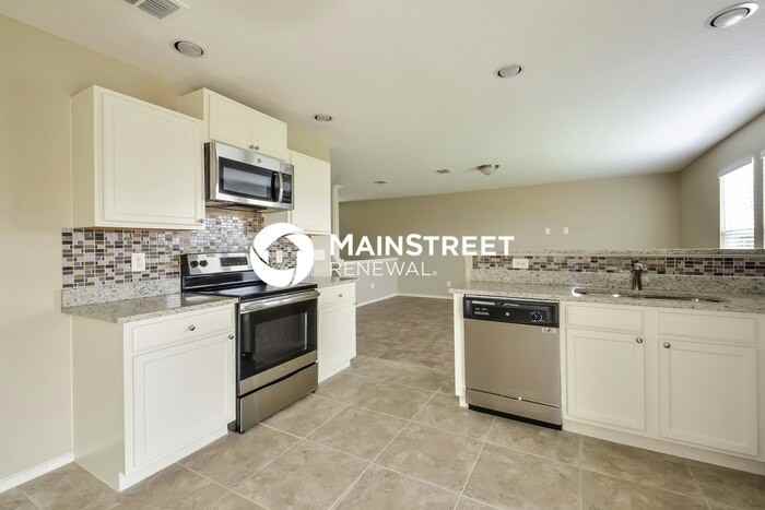 12919 Wrangler Way - Photo 6 of 15
