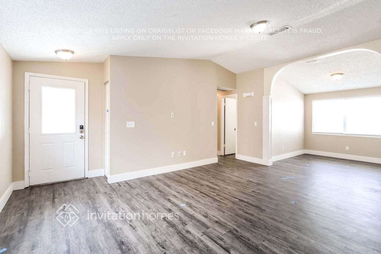 8205 Olivewood Pl - Photo 3 of 15