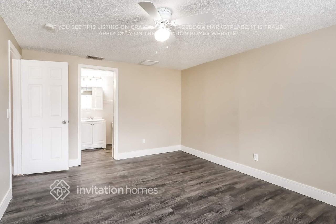 8205 Olivewood Pl - Photo 7 of 15