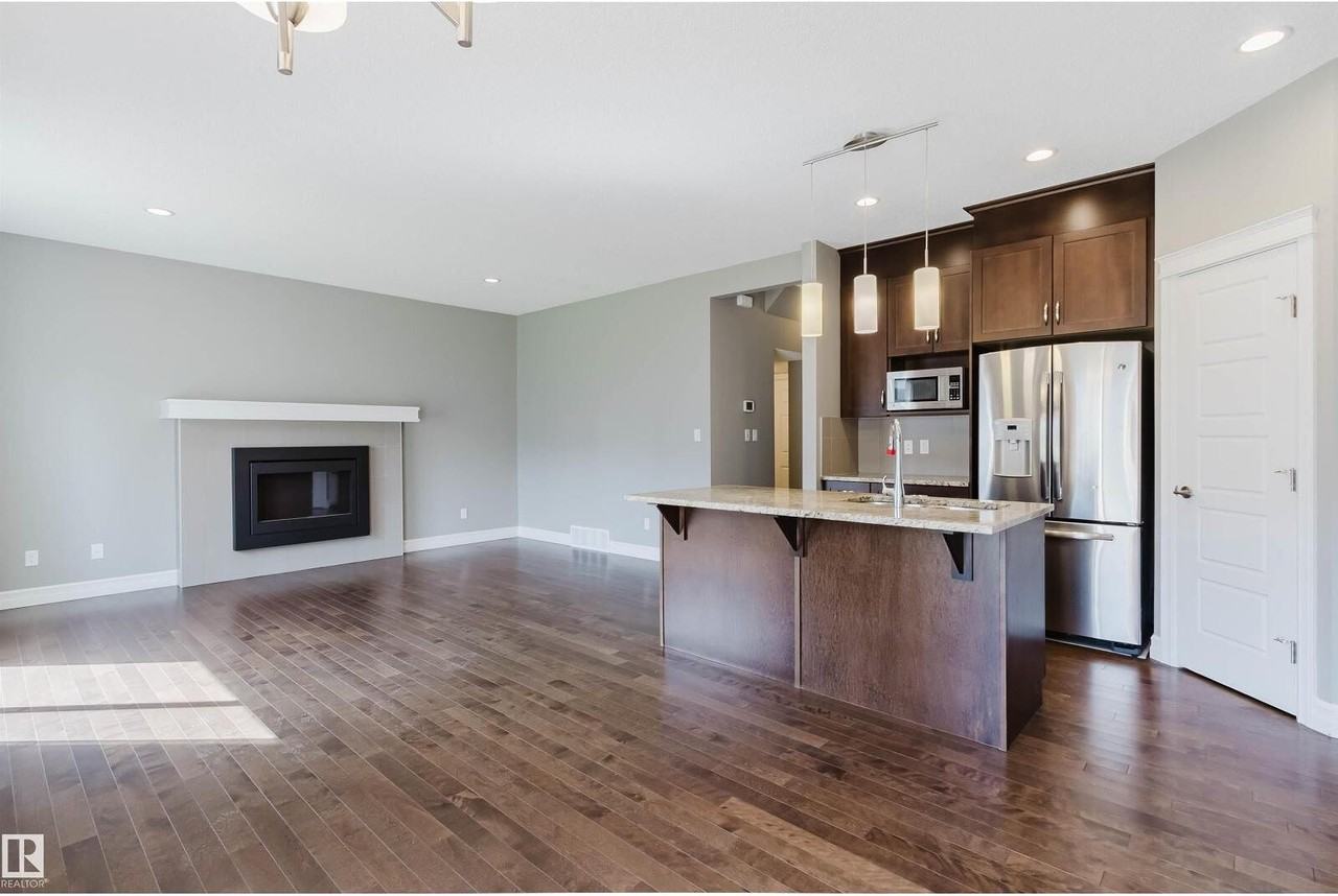 15839 10 Ave Sw - Photo 7 of 13