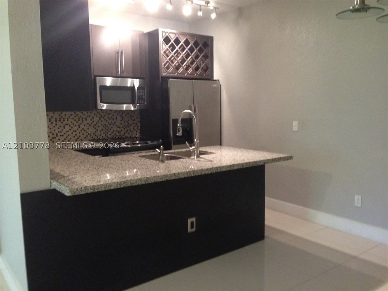 18314 Nw 68th Ave #N - Photo 2 of 15
