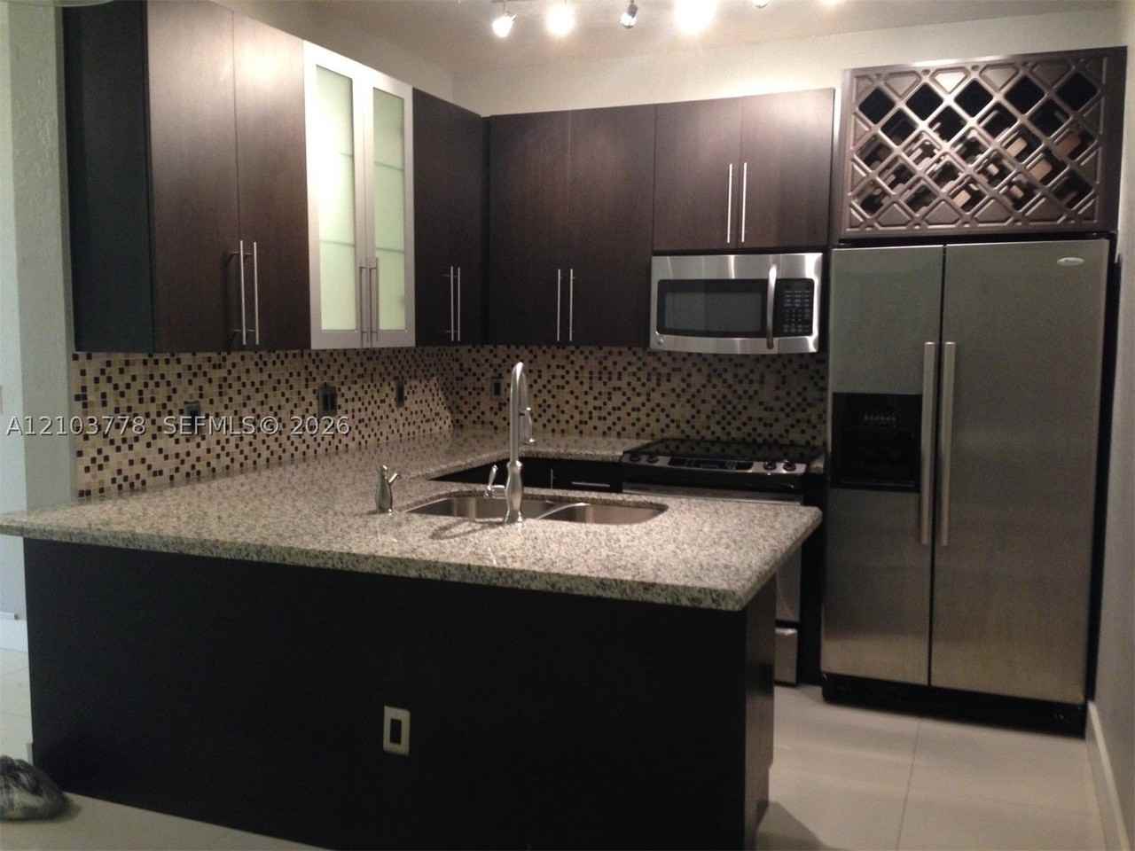 18314 Nw 68th Ave #N - Photo 3 of 15