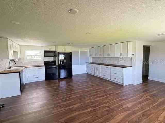 4519 Ne County Road 660 - Photo 3 of 4