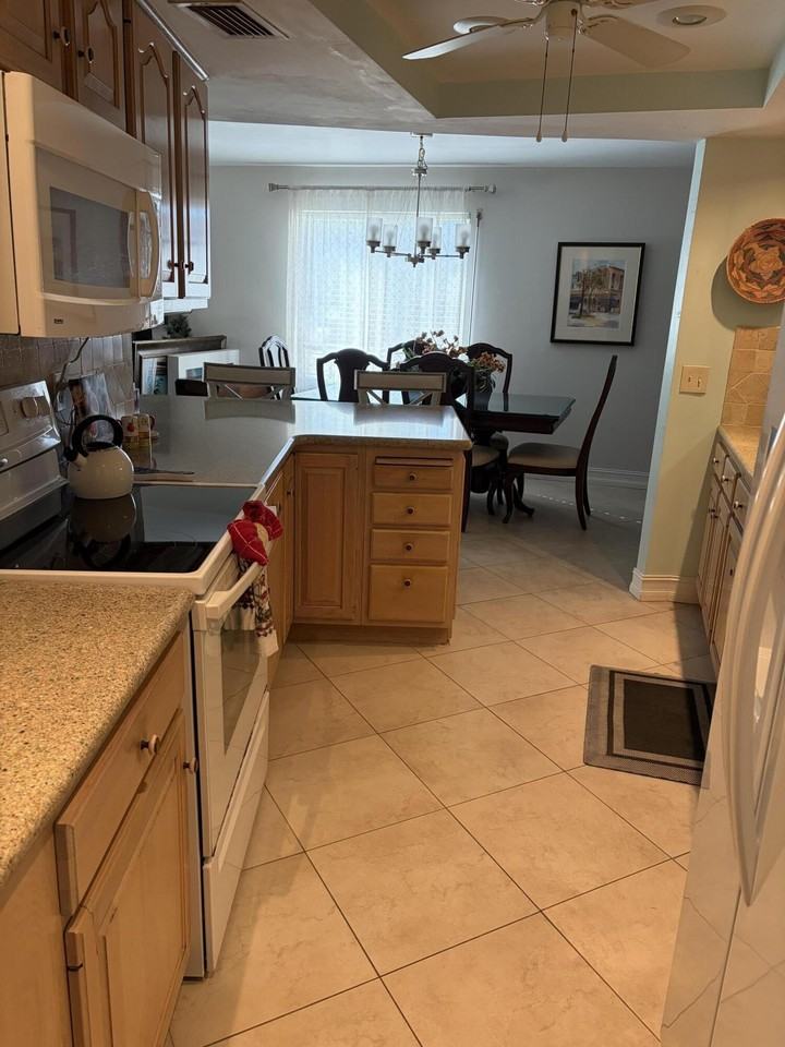 11811 Avenue Of P G A #3-1F - Photo 4 of 19