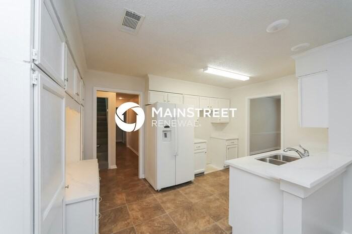8849 Woodmark Dr - Photo 5 of 17