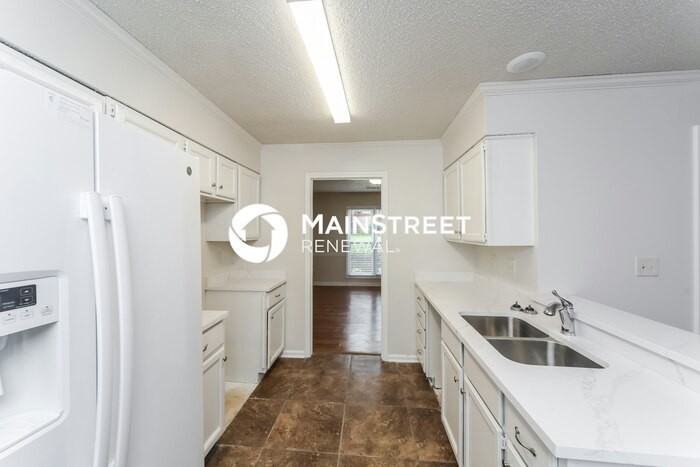 8849 Woodmark Dr - Photo 6 of 17