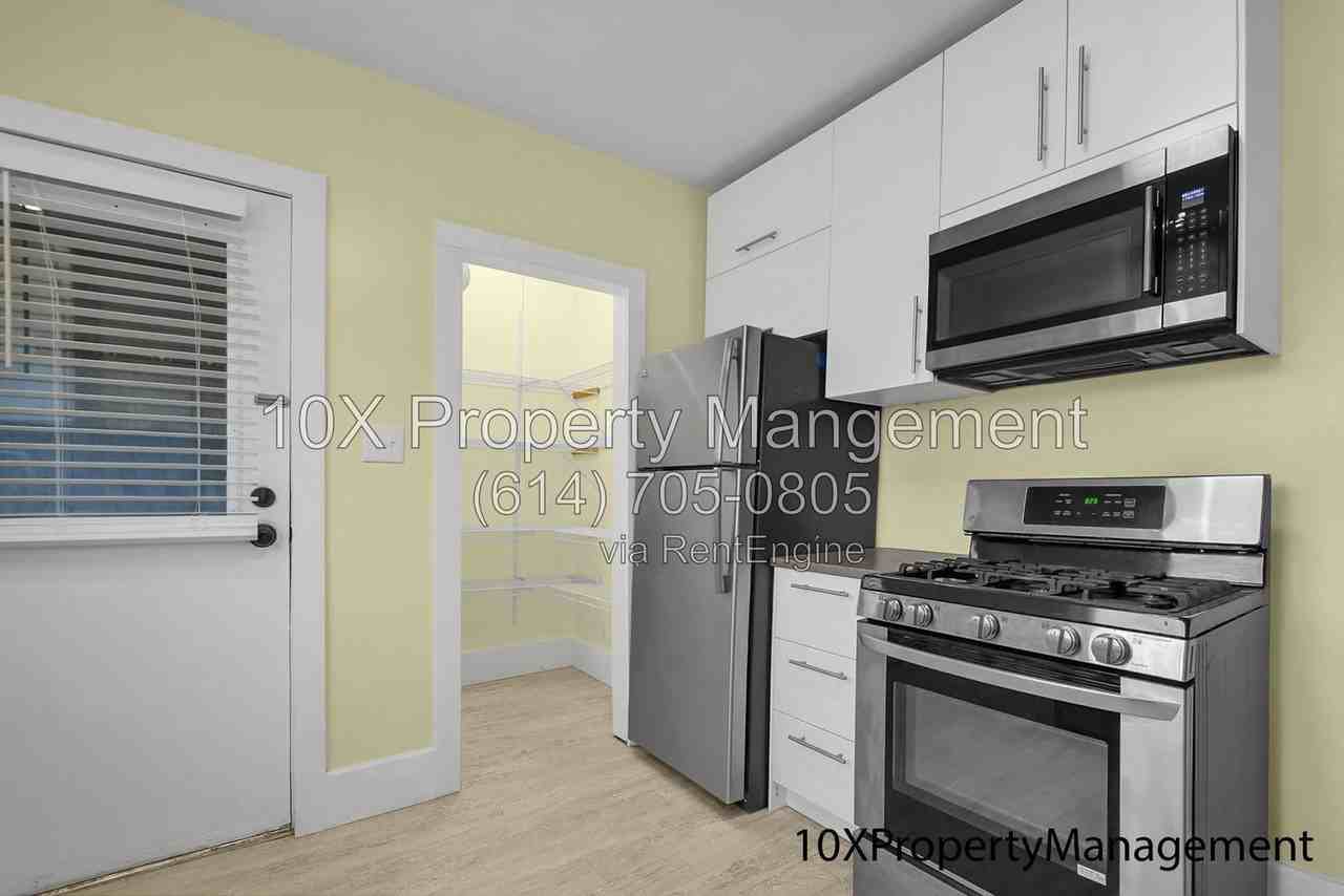 456 E Tompkins St - Photo 7 of 34