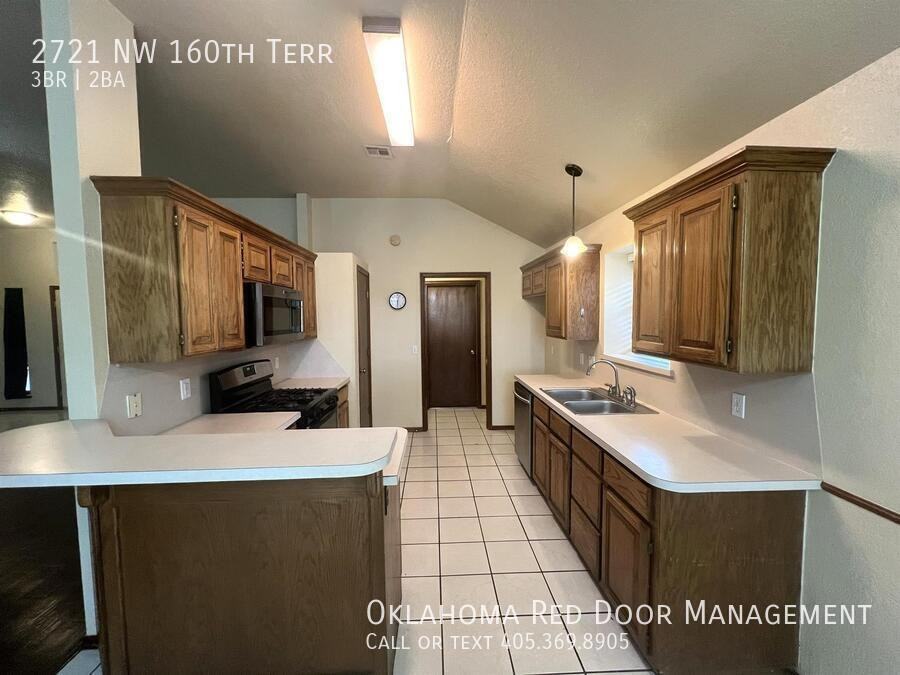 2721 Nw 160th Ter - Photo 2 of 14