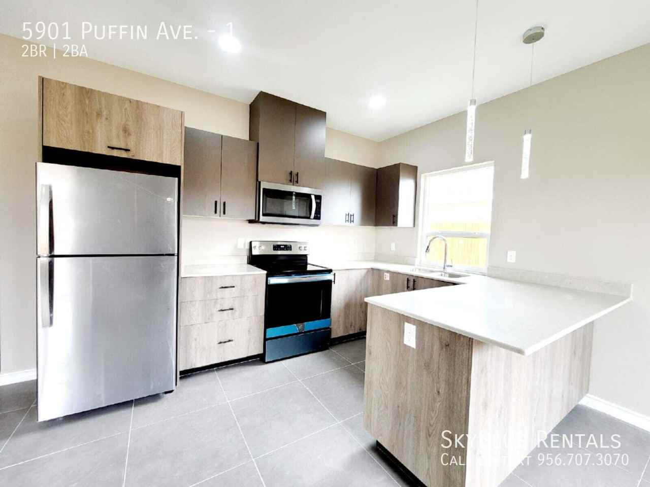 5901 Puffin Ave #1 - Photo 5 of 13