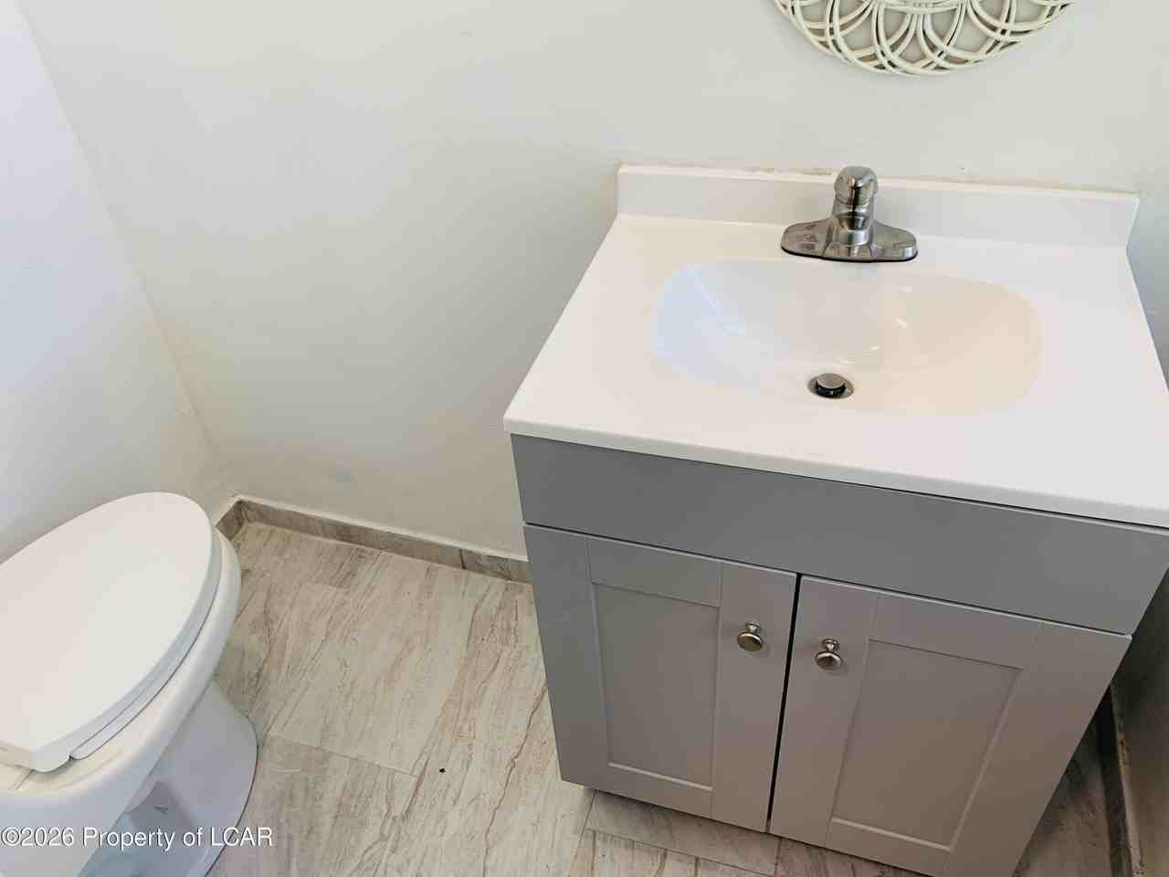 166 Academy St - Photo 5 of 12
