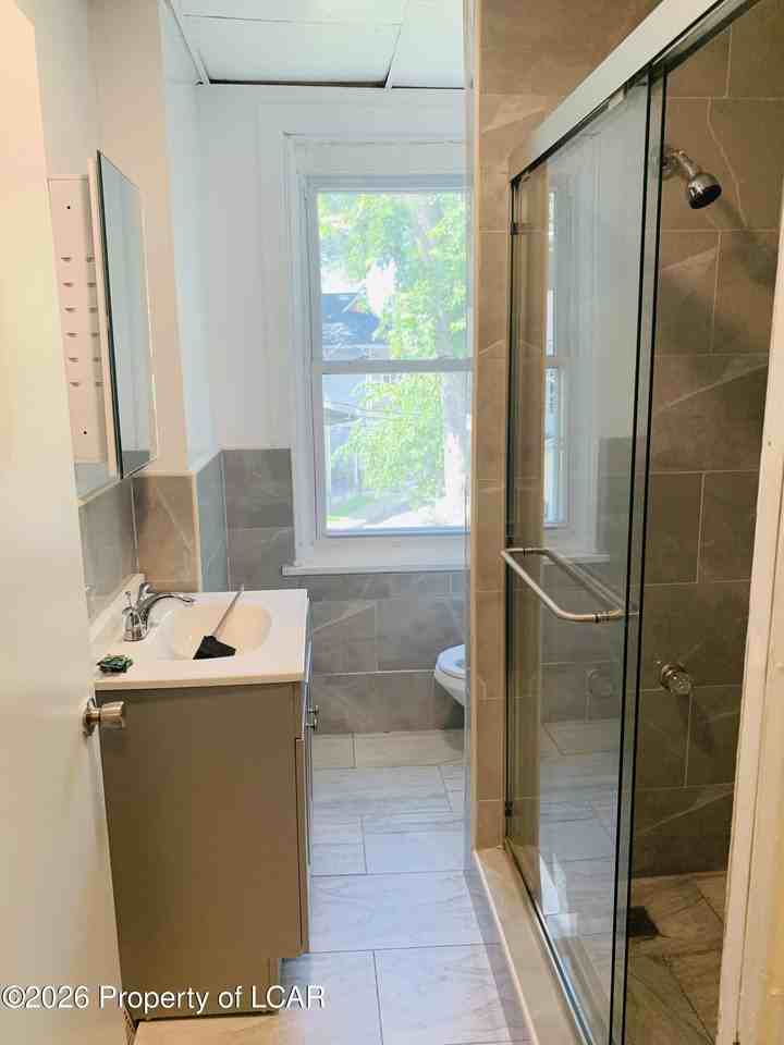 166 Academy St - Photo 6 of 12