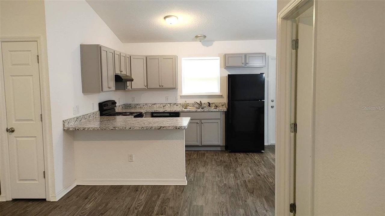 6195 Nw 54th Ter - Photo 4 of 5