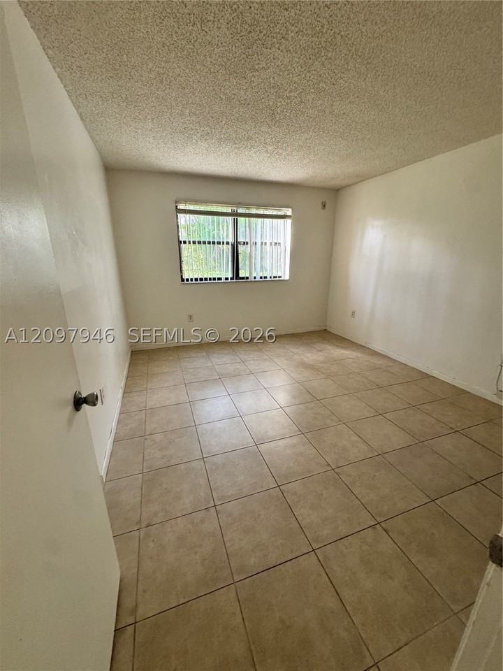 7070 Nw 179th St #105 - Photo 4 of 8