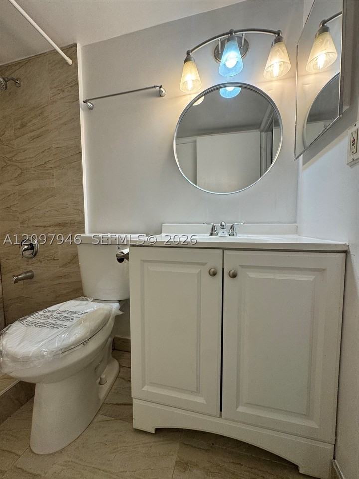 7070 Nw 179th St #105 - Photo 6 of 8