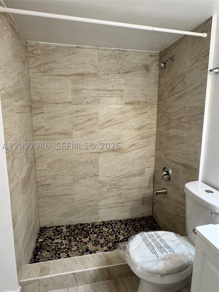 7070 Nw 179th St #105 - Photo 7 of 8