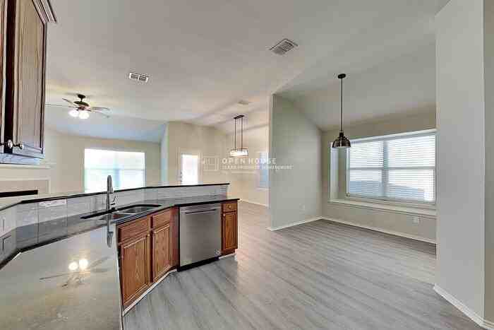 12301 Angel Food Ln - Photo 6 of 22