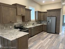 featured image of 109 - 2 W GRAND RIVER Avenue