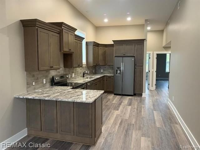 109 - 2 W GRAND RIVER Avenue - Photo 6 of 13
