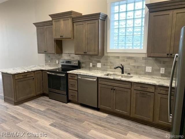 109 - 2 W GRAND RIVER Avenue - Photo 7 of 13