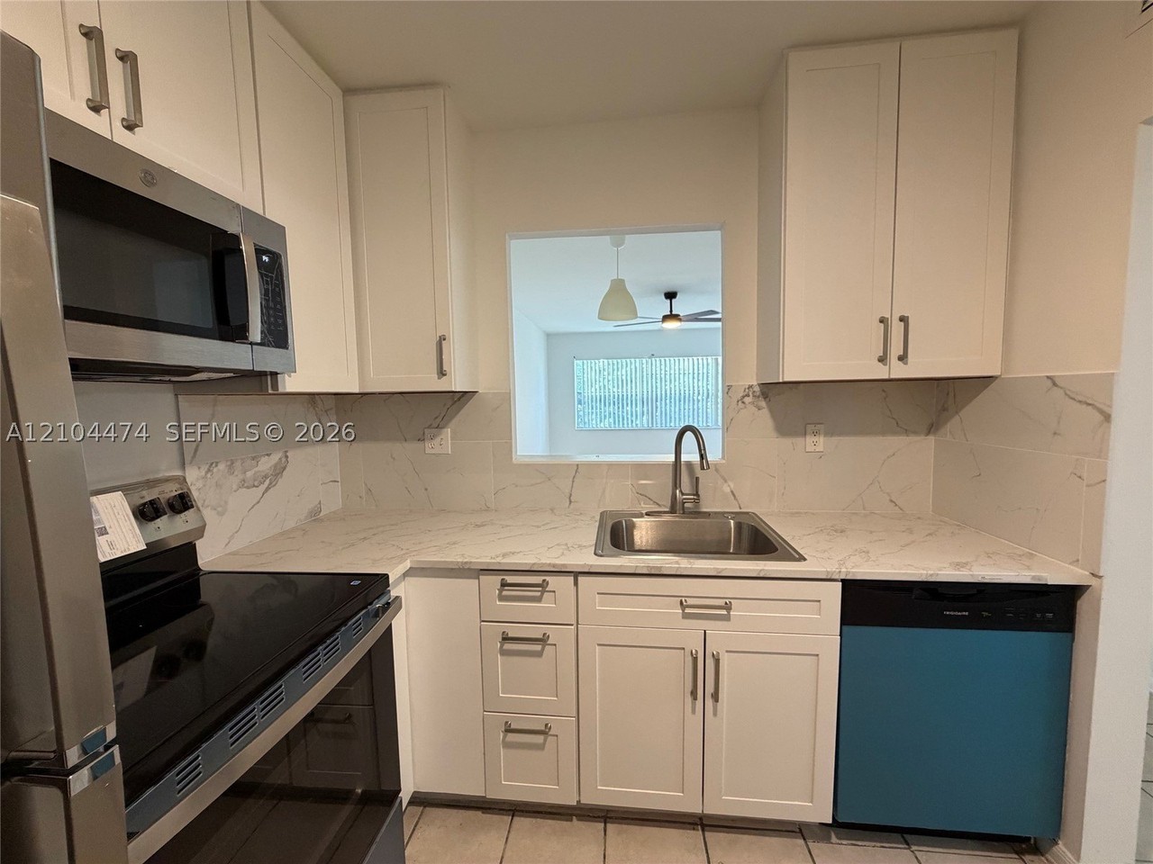 5001 W Oakland Park Blvd #305 - Photo 3 of 14