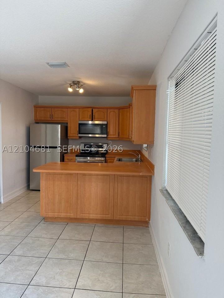 3715 Nw 23rd Ct #3715 - Photo 4 of 20