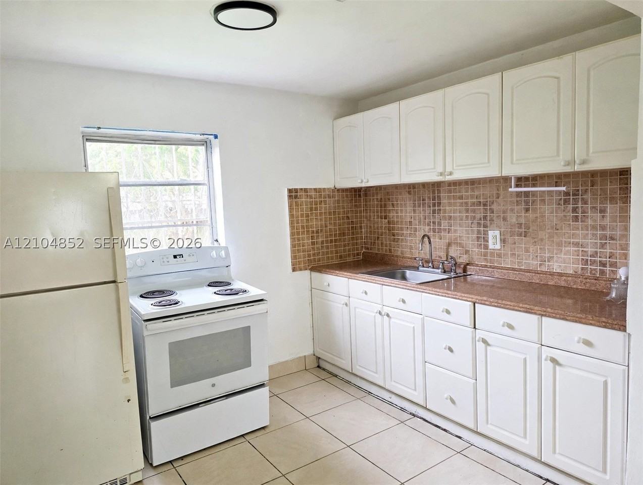 5701 Raleigh St - Photo 2 of 13