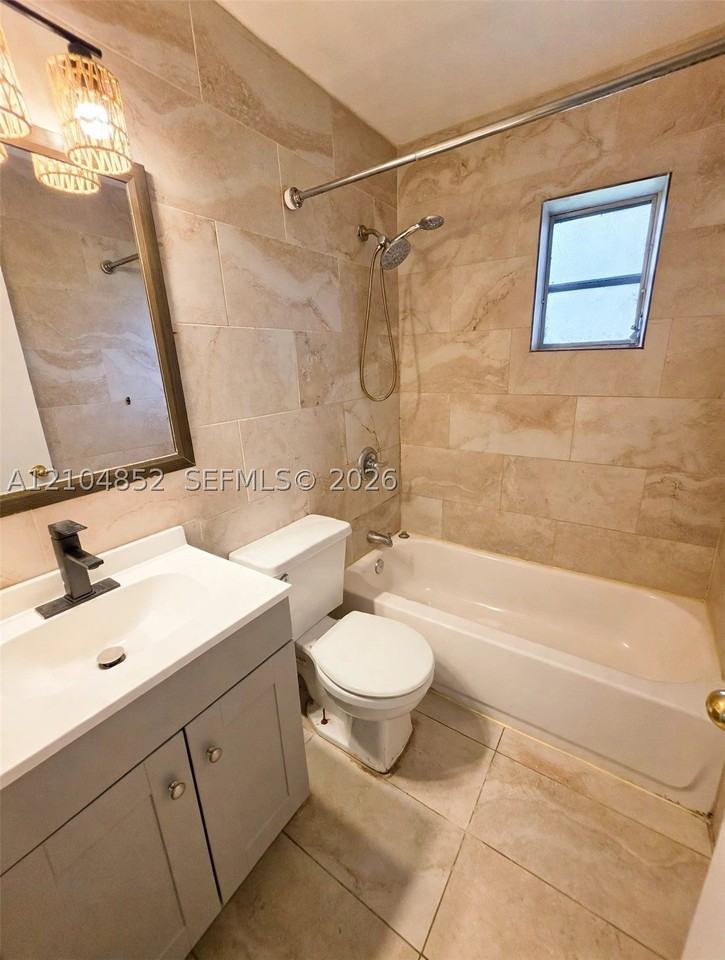 5701 Raleigh St - Photo 3 of 13