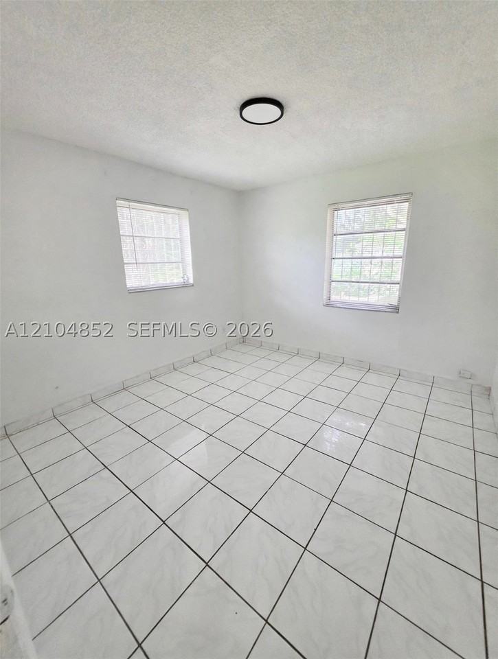 5701 Raleigh St - Photo 5 of 13