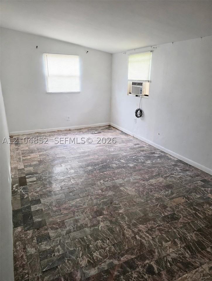 5701 Raleigh St - Photo 7 of 13