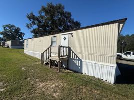 featured image of 1 Water Oak Ln