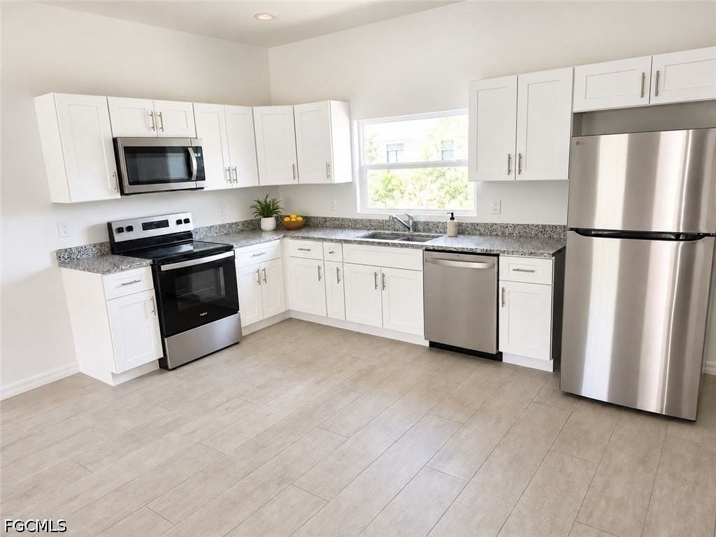 763 Puccini Ave S - Photo 3 of 9