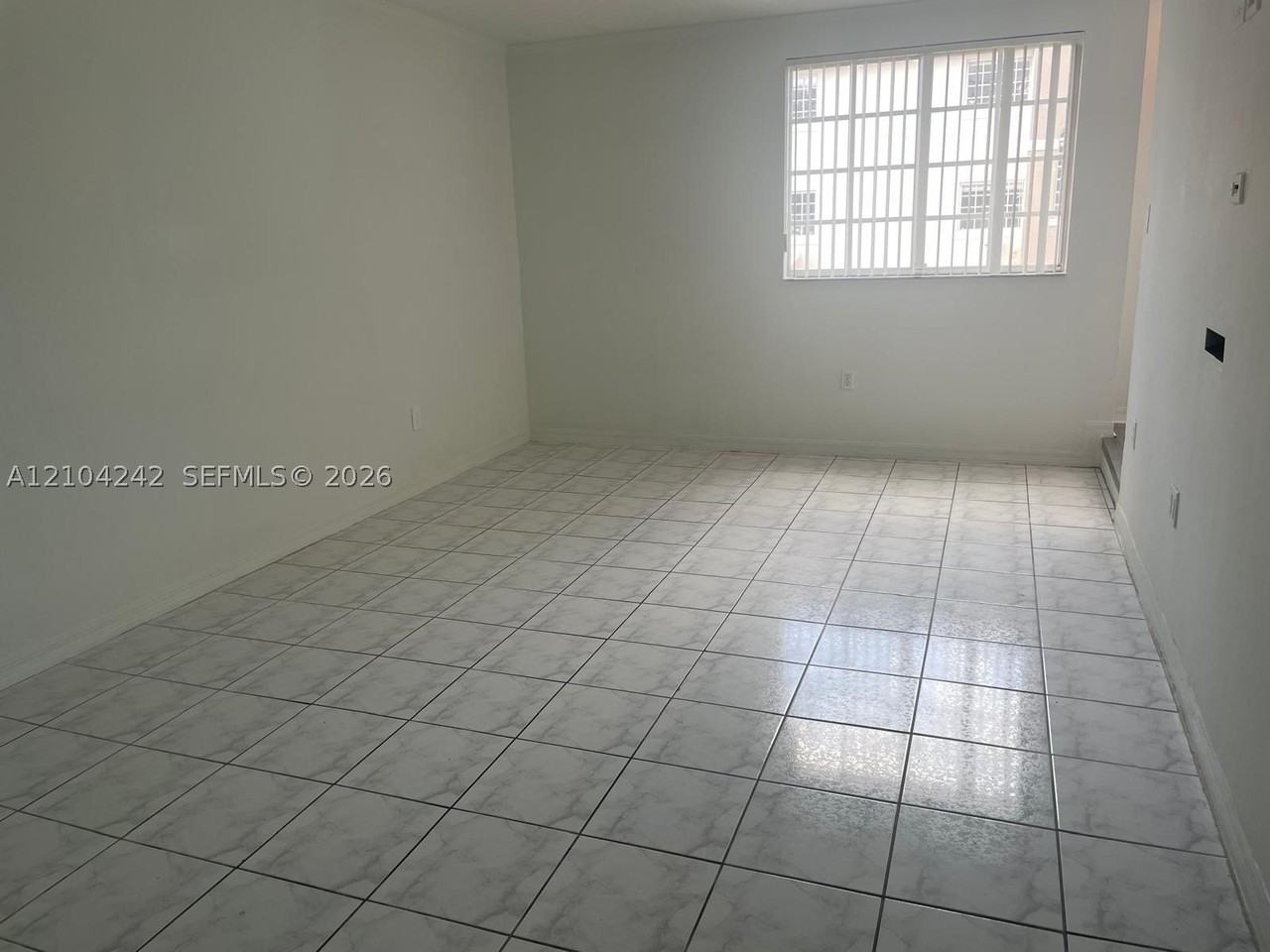 12025 Sw 14th St #203 - Photo 3 of 5
