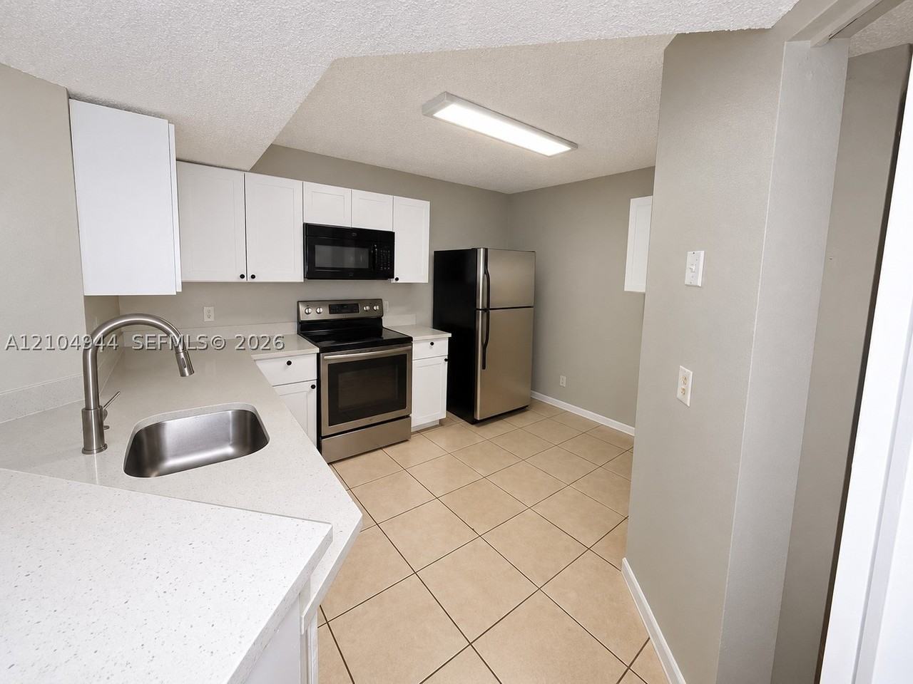 8821 Wiles Rd #102 - Photo 2 of 27