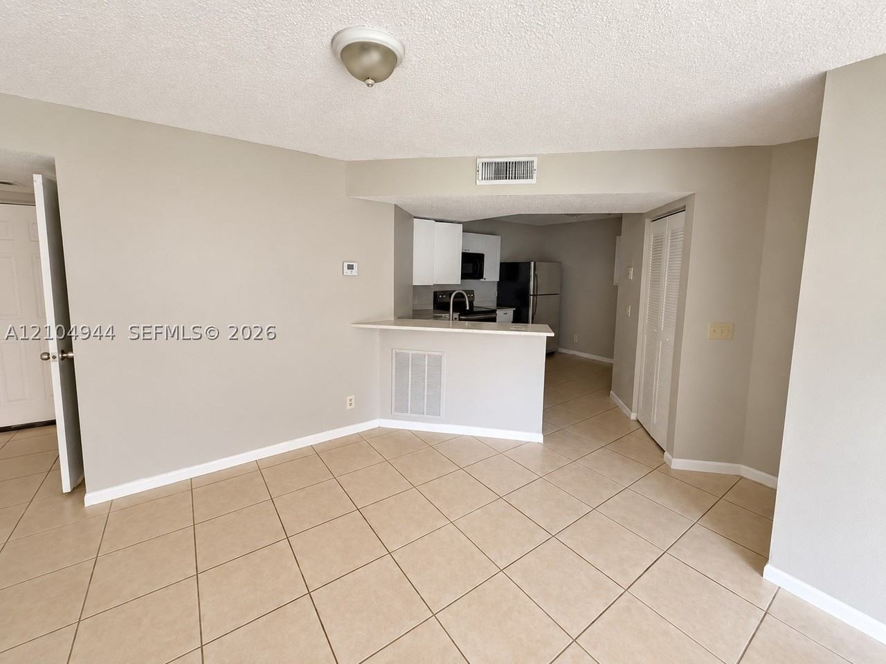 8821 Wiles Rd #102 - Photo 3 of 27