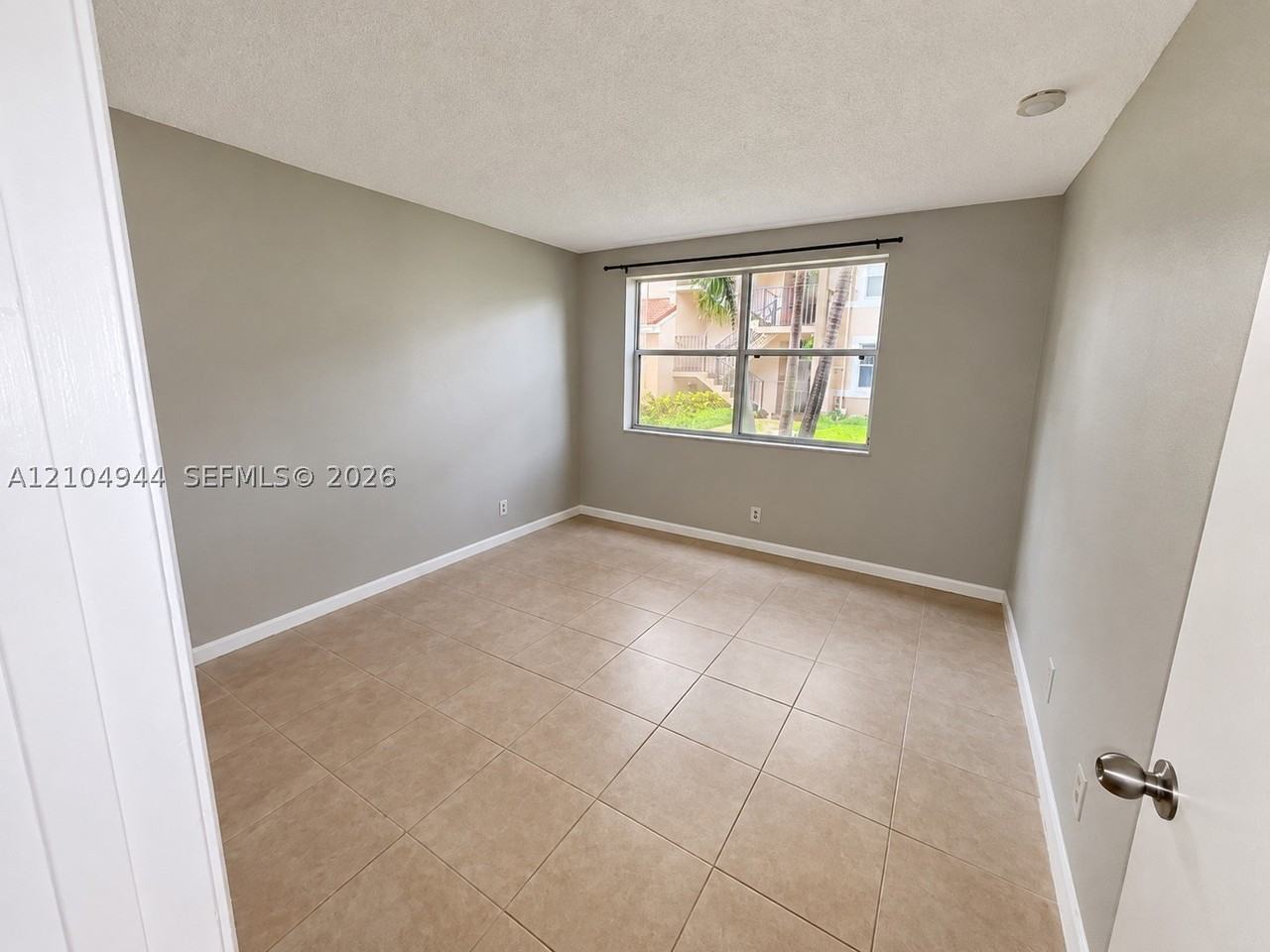 8821 Wiles Rd #102 - Photo 6 of 27