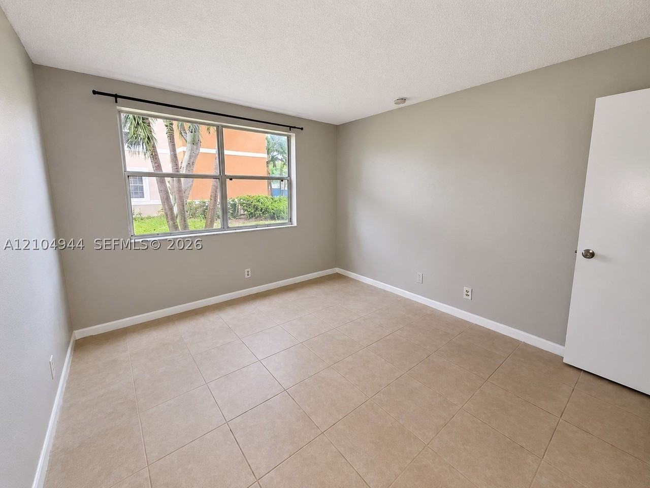 8821 Wiles Rd #102 - Photo 7 of 27