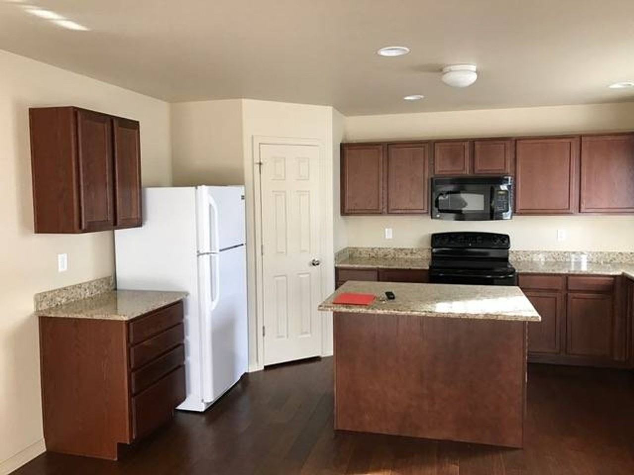 7663 Manistique Dr - Photo 2 of 14