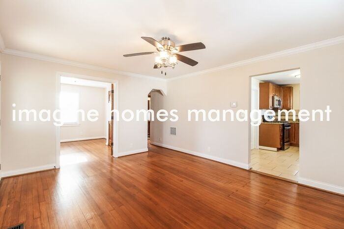 8315 Saint Clair Ave - Photo 4 of 16