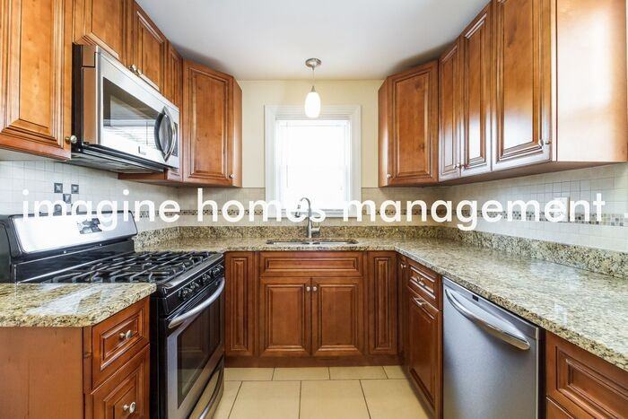 8315 Saint Clair Ave - Photo 7 of 16