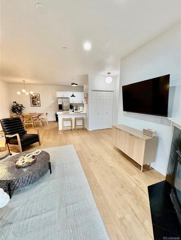 7222 S Blackhawk St #105 - Photo 2 of 26