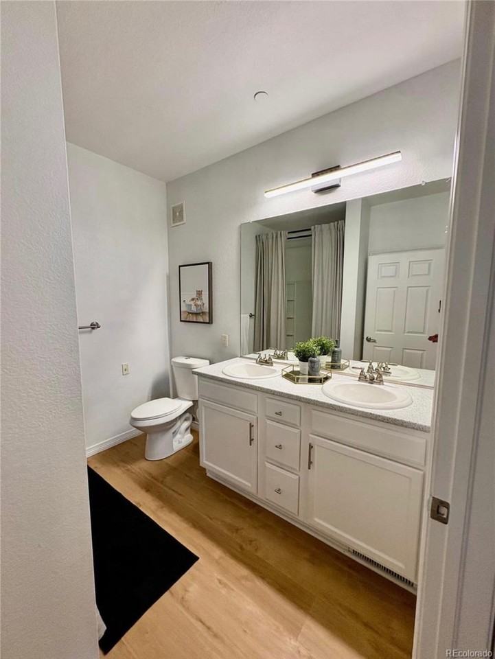 7222 S Blackhawk St #105 - Photo 4 of 26