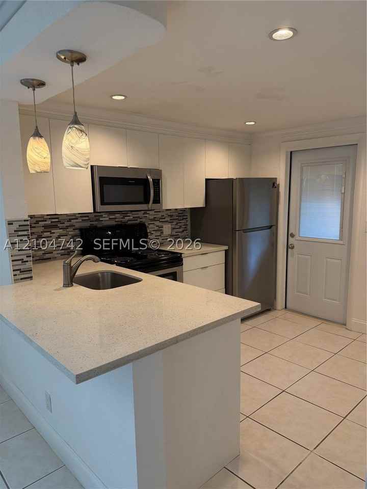 3777 NW 78 AVE #1A - Photo 3 of 21